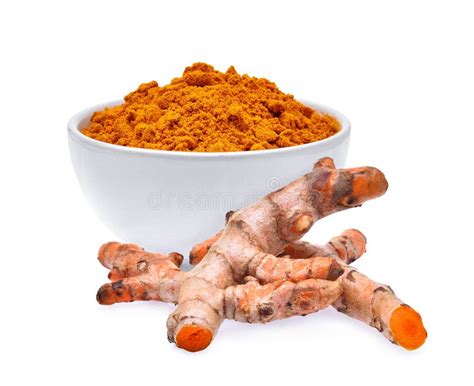 Radice di curcuma fresca e in polvere